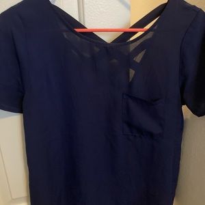 Lily White navy blouse with criss-cross back